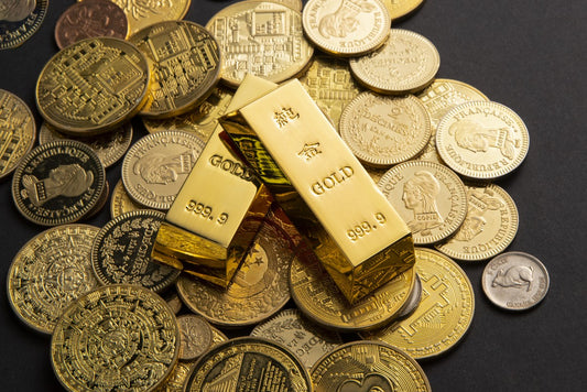 Gold- und Silberbarren vs. Münzen im Vergleich
