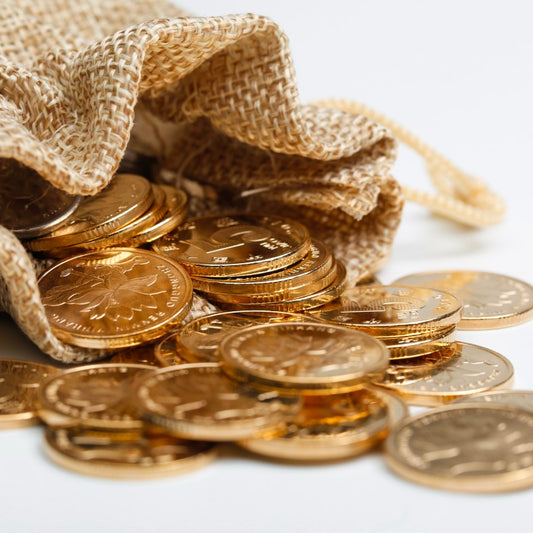 Die Geschichte von Goldmünzen & Goldbarren